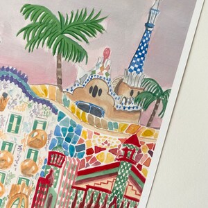May include: Watercolor painting of a colorful building with a mosaic facade and a tall, checkered tower. The building is surrounded by palm trees and a pink sky.