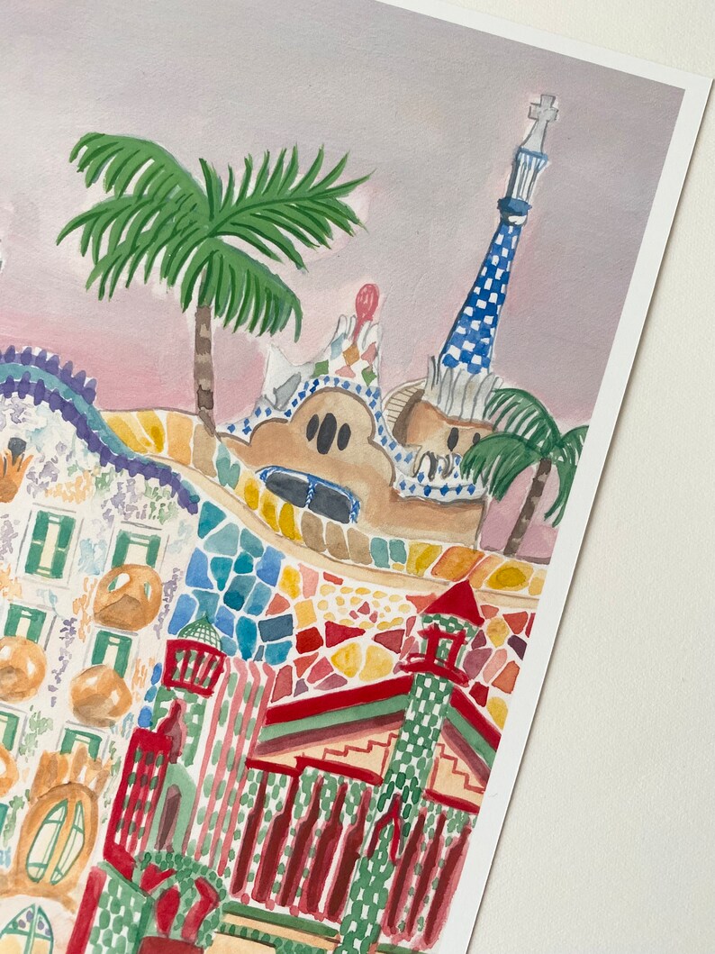 May include: Watercolor painting of a colorful building with a mosaic facade and a tall, checkered tower. The building is surrounded by palm trees and a pink sky.