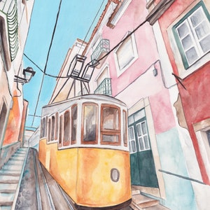 May include: A yellow vintage tram travels up a steep, cobblestone street in a city with colorful buildings. The tram has large windows and a brown roof. The buildings are painted in shades of pink, red, and blue.
