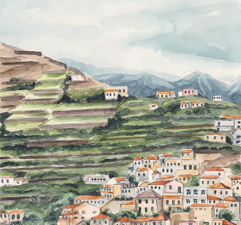 May include: Watercolor painting of a hillside village with terraced fields. The village is made up of white buildings with orange roofs. The hillside is green and brown with a blue sky in the background.