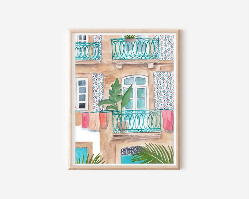 May include: A watercolour painting of a building with a balcony and a window. The building is painted in shades of brown, blue, and green. There are plants on the balcony and laundry hanging on a line.