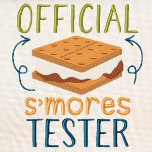 May include: Embroidered design featuring a s'more with the text "OFFICIAL s'mores TESTER" in green, orange, and blue thread.