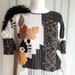 see more listings in the Sweaters / Ponchos section