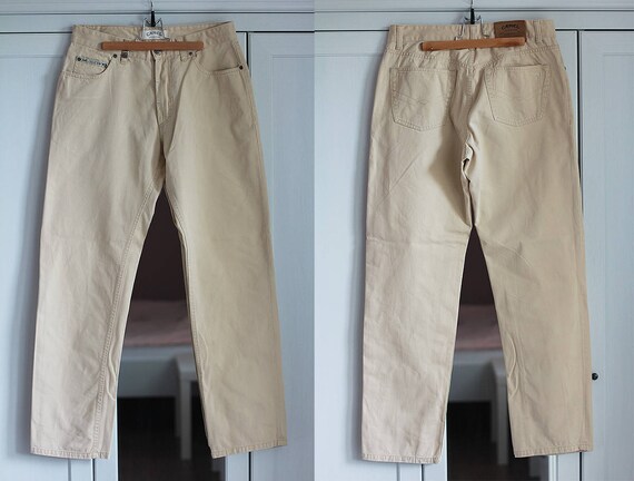 beige colored women's jeans