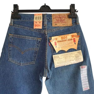 Levi&#39;s 501 Jeans High Waist Size W26  L30 Vintage New with Tags Mid Blue Denim Deadstock Levis Pants Size XS - S