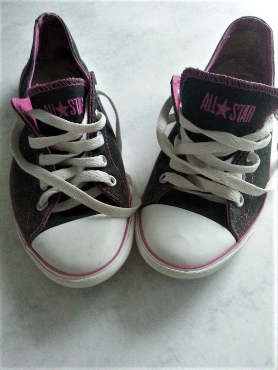 black and purple trainers