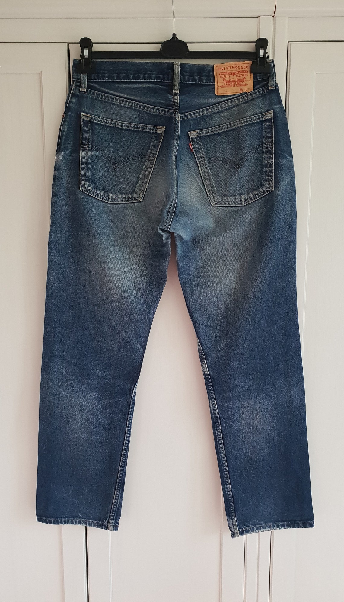 levis 521 high waisted jeans