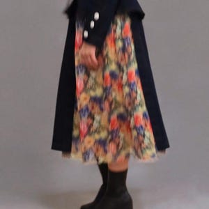 Falda larga vaquera para mujer: falda asimétrica de capas con inserción de tul y diseño llamativo.