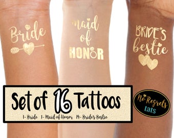 May include: Set of 16 gold temporary tattoos for a bridal party. The tattoos say "Bride", "Maid of Honor", and "Bride's Bestie".
