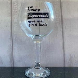 I’m feeling supersonic give me gin and tonic gin glass. A great gift for oasis fans