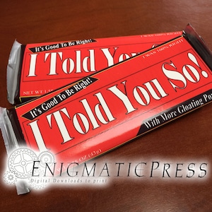 May include: Two chocolate bars with red wrappers and the text "I Told You So!" in large white letters. The wrappers also feature the phrases "It's Good To Be Right!" and "With More Gloating Power." The bars are 43g.