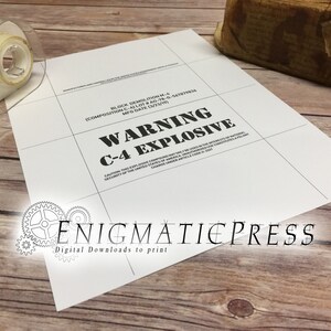 May include: A black and white warning sign with the text "WARNING C-4 EXPLOSIVE" and the following information: "BLOCK DEMOLITION M-4 (COMPOSITION C-4) LOT#AD-78-0-567879836 MFG DATE (3/23/19)". The sign also includes the text "CAUTION THIS EXPLOSIVE COMPOUND MAY ONLY BE USED IN THE INTERESTS OF NATIONAL SECURITY OF THE UNITED STATES OF AMERICA. UNAUTHORIZED USE CONSTITUTES A FELONY CHARGE UNDER ARTICLE CODE W-740."