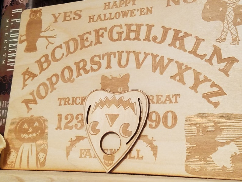 Tavola Ouija Laminata Con Planchette - Gioco Mistico UYD 30x20cm