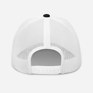 May include: White mesh trucker hat with a black crown and a plastic adjustable strap.