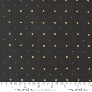 May include: Dark fabric with a repeating pattern of large tan and small gray polka dots. The fabric is a solid black color. The image includes a ruler along the bottom edge, with the word "moda" printed on it.