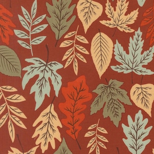 May include: A fabric pattern featuring a dense arrangement of various leaf shapes in shades of sage green, cream, and burnt orange, all set against a solid deep rust-colored background. The leaves display detailed vein structures throughout.