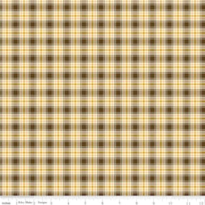 May include: A brown and yellow plaid fabric with a subtle texture. The fabric is woven with thin stripes of brown, yellow, and white.