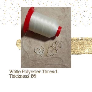 May include: A spool of white polyester thread with a red cap, and two small white crocheted pieces. White Polyester Thread Thickness 20.