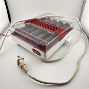 Vintage Set of Vidal Sassoon Hot Rollers / Curlers and Clips -all are clean and in good condition - Heats up - AS IS