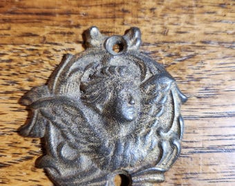 Vintage Brass Medallion probably used for a piece of antique furniture emblem or plate  3" x 2.25"  Pretty Dark Patina / Cherub or Greek