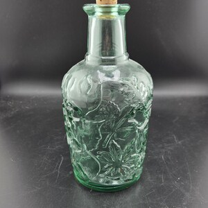 Vintage Libbey of Canada Light or Sea Green Glass Bottle with Cork Embossed with Maple Leaf and Floral Pattern - Height 8.5"