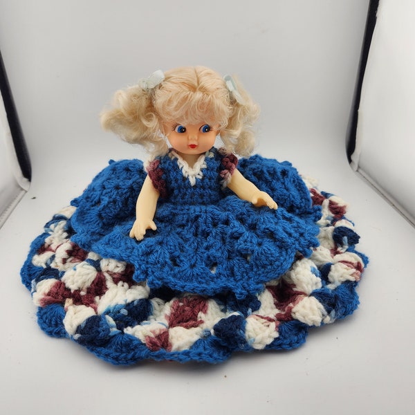 Vintage Plastic Doll with beautiful hand made crochet dress.  Blue, wine, white yarn with 2 layer dress.  Painted face / 9.5"