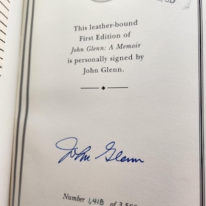 Vintage  Book John Glenn A Memoir / Signed 1st Edition / Leather Bound / Library card pocket inside front cover / Library stamp on page