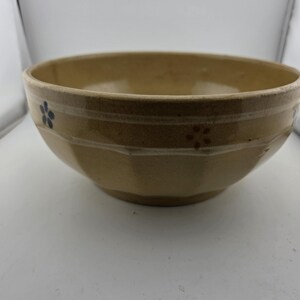 May include: A set of three ceramic mugs with a speckled, matte finish. The mugs are in shades of cream, light gray, and dark gray. Each mug has a simple, minimalist design, perfect for coffee or tea.