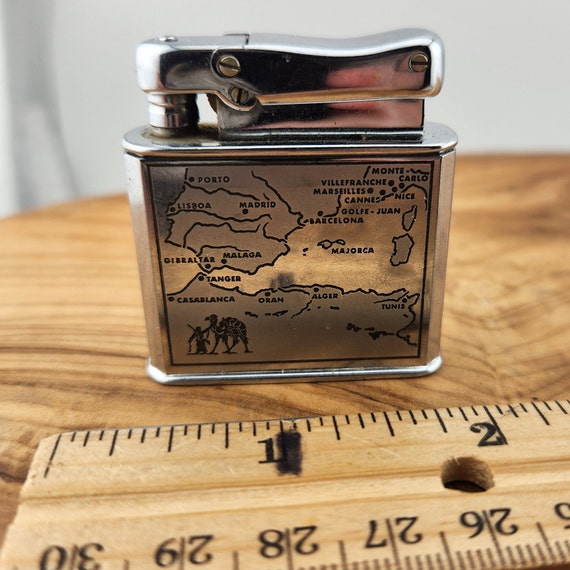 european cigarette lighter Vintage Cowow Monopol Cigarette Lighter Depicting the Africa and Middle  East Region - as Is