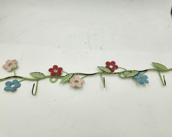 Vintage Metal 18.5" Long Wall Hanging with 3 Hooks.  distressed with blue and pink flowers.  Cute for keys or other lightweight items