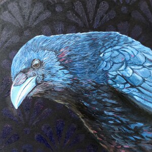 May include: A close-up of a blue raven with a dark background. The raven's feathers are detailed with shades of blue and black, and its beak is white.