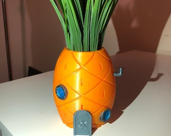 Op spongebob geïnspireerde huisananasbak (met nepplant), gemaakt van PLA