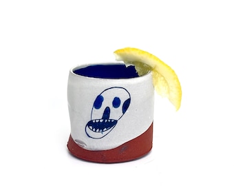 Handmade wheel-thrown illustrated ceramic cup