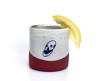 Handmade wheel-thrown illustrated ceramic cup