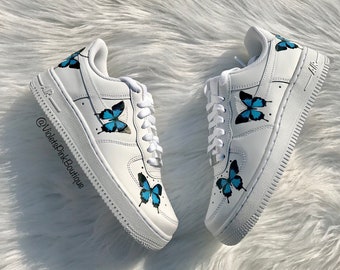 white air forces with blue butterflies