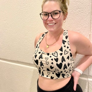 Neutral Black and Cream Hearts Women&#39;s Longline sports bra activewear for yoga, running, spinning