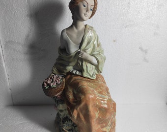 Nadal Porcelain woman sitting with flowers