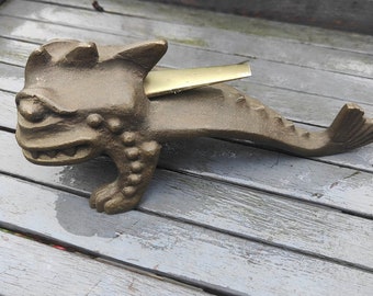 Bronze "Fire Breathing Dragon" lighter by Alfred Dunhill, circa 1960