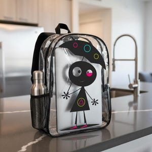 May include: Transparent backpack with black edging, showcasing a black cartoon character with a pink eye and colourful details. A silver water bottle is in the side mesh pocket. A laptop is inside.