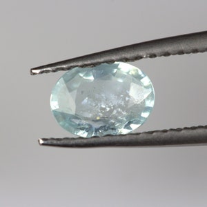 Mesmerizing 0.44 Carats Blue PARAIBA Tourmaline. 6.3x4.6 MM Oval. Intense Glow.