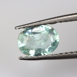 Mesmerizing 0.67 Carats Blue PARAIBA Tourmaline. 6.7 x 5 MM Oval. Intense Glow.