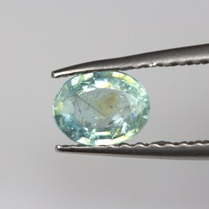 Mesmerizing 0.36 Carats Blue PARAIBA Tourmaline. 5.6 x 4.5 MM Oval. Intense Glow.