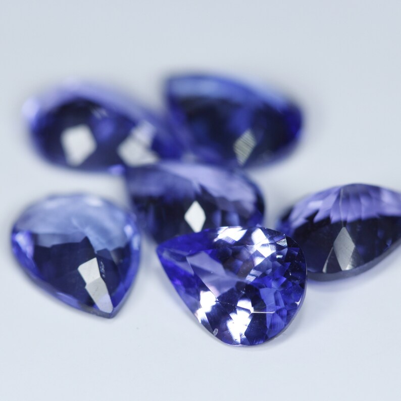DEEP Color Tanzanite Faceted Pears 6x8 mm Price per piece. Size SELECT Size Eye Clean to Loupe Clean Quality