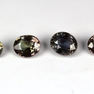 2.24 Carats High Grade Color Change Garnet Faceted Ovals. 4 Piece Lot. 5x4 MM Ovals. REASONABLE PRICE.
