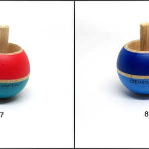 The wooden Handmade Magic spinning top in a Handmade box. History of top included in Greek & English image 5