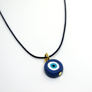 Blue Cord handmade Evil eye necklace. Raf Blue