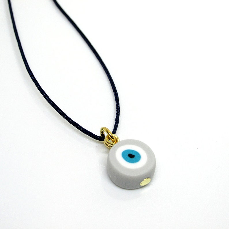 Blue Cord handmade Evil eye necklace. Gray