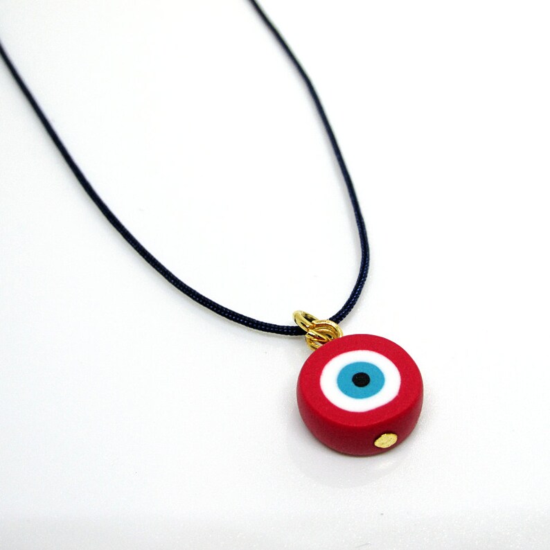 Blue Cord handmade Evil eye necklace. Red