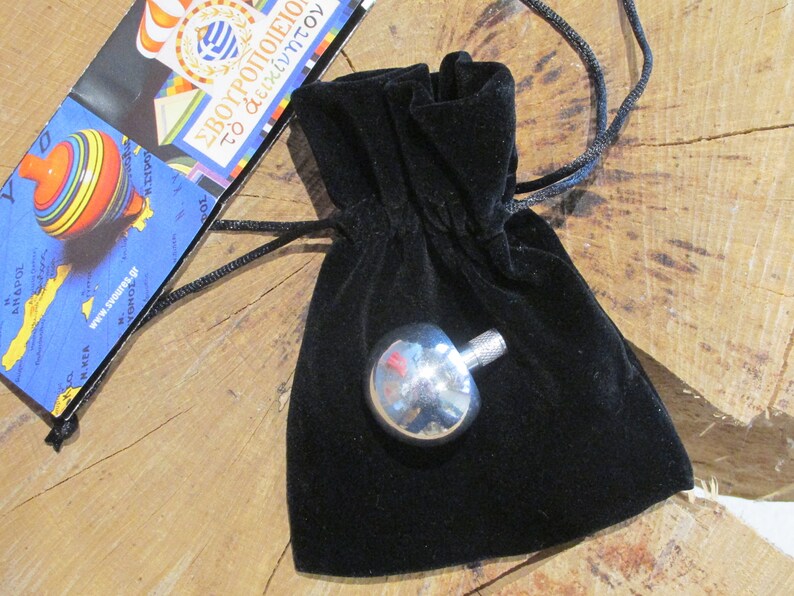 The Aluminium Handmade Magic Spinning Top. history of Top Included in