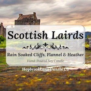May include: A hand-poured soy candle with a label that reads "Scottish Lairds Rain Soaked Cliffs, Flannel & Heather" and "HopbrookLane Candle Co.". The candle is set against a backdrop of a Scottish castle and a bridge.